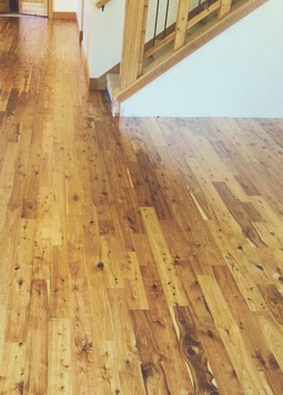 Picture - unfinished Australian Cypress flooring, after installation and finishing.