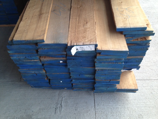 Photo - close-up of Australian Cypress lumber planks.
