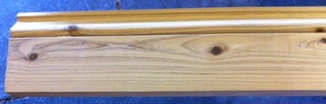 Photo - Australian Cypress colonial baseboard molding, unfinished.