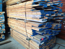 Photo - stack of Australian Cypress rough lumber.